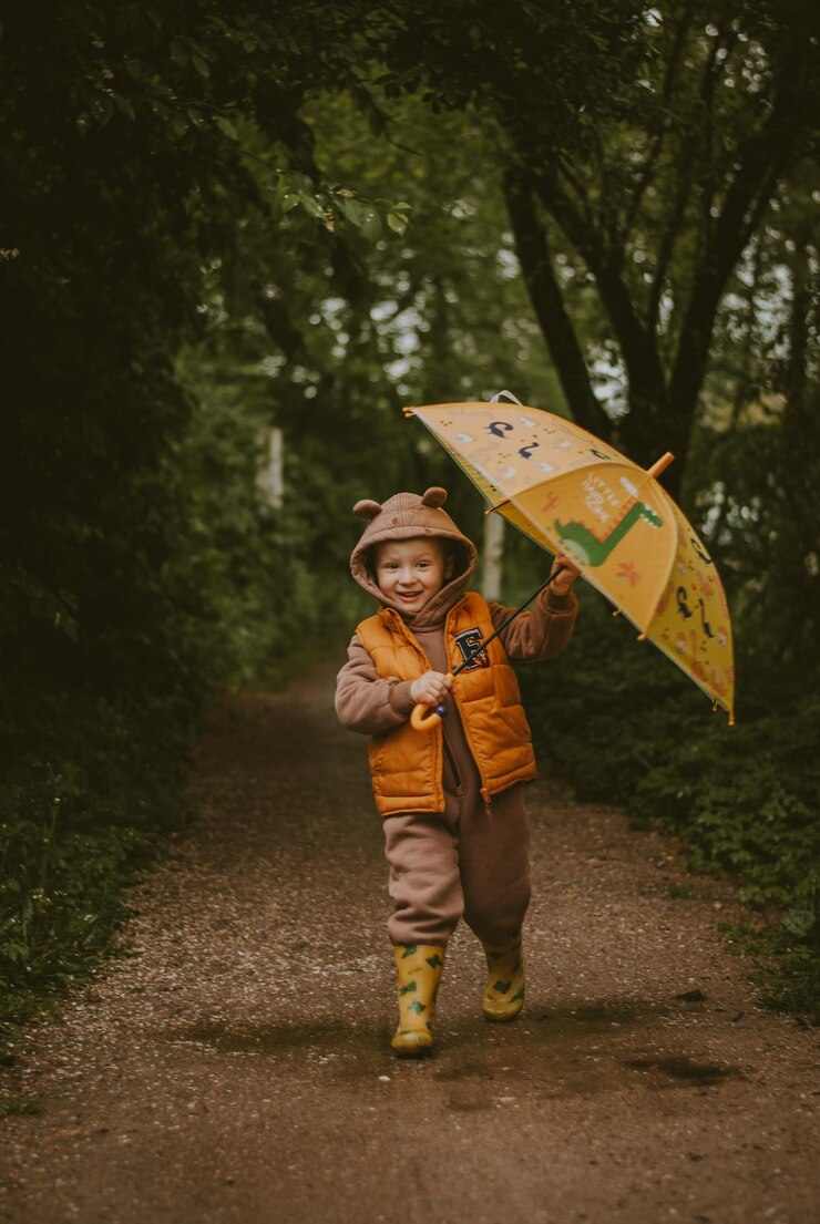 A boy in the rain