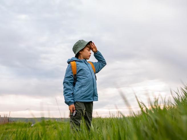 kid exploring natural environment
