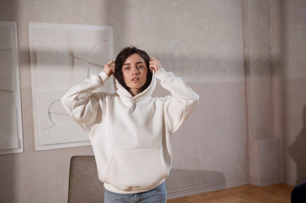 Medium shot woman wearing white hoodie